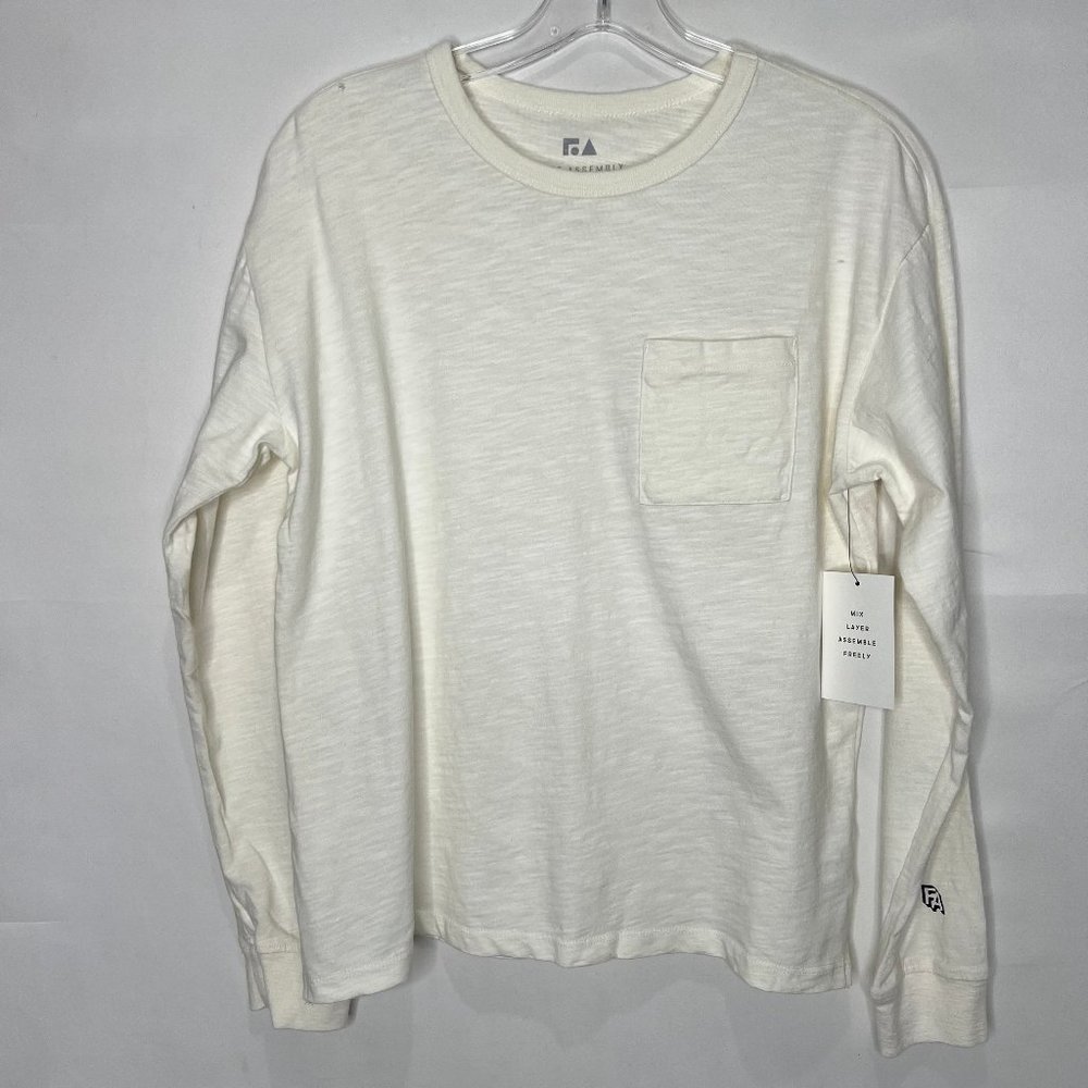 NWT Free Assembly Boy Shirt sz XL Beige Pocket Logo Long Sleeves T-Shirt